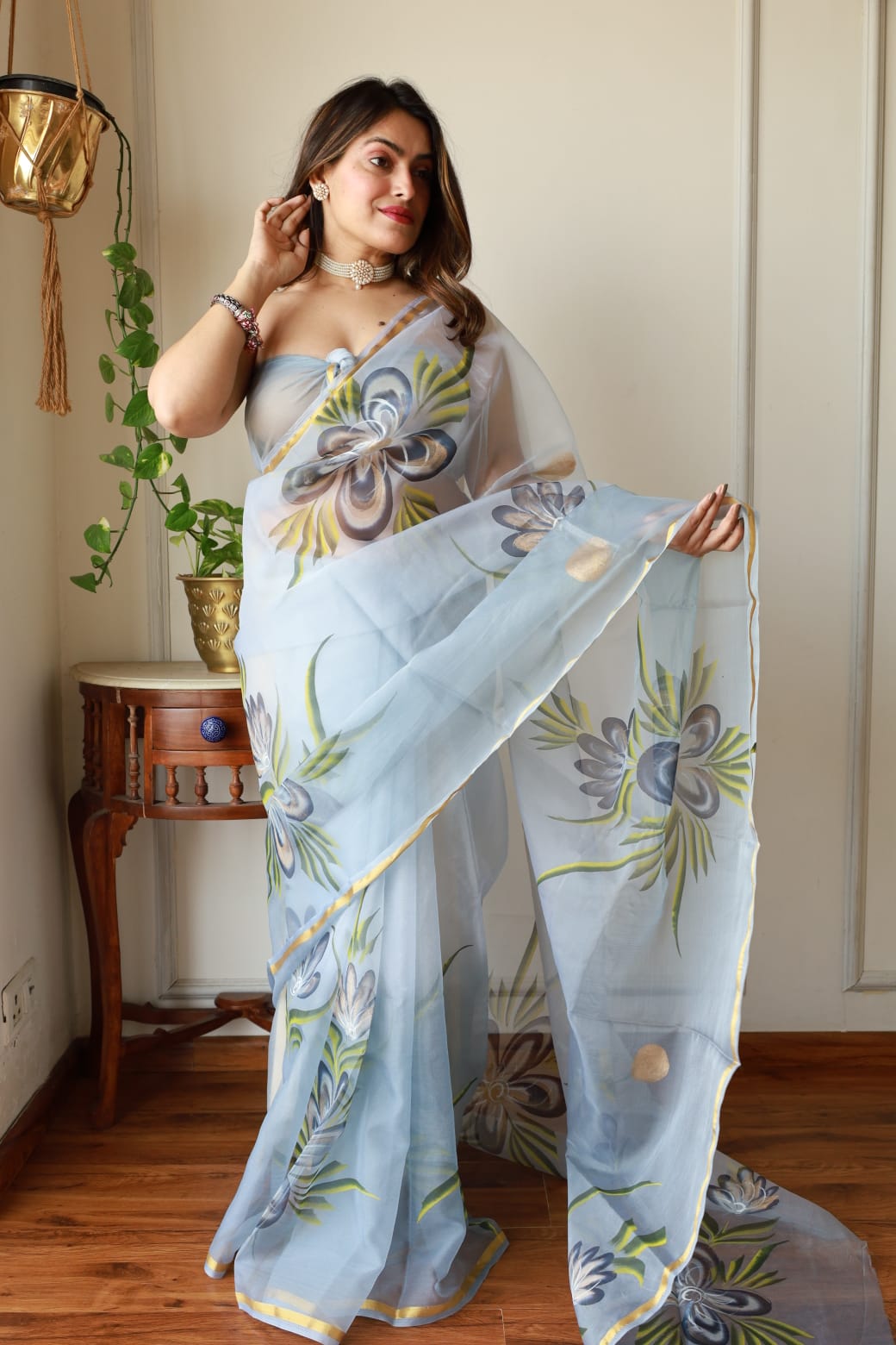 Exclusive Hand-Painted Organza Saree Collection with Golden Print